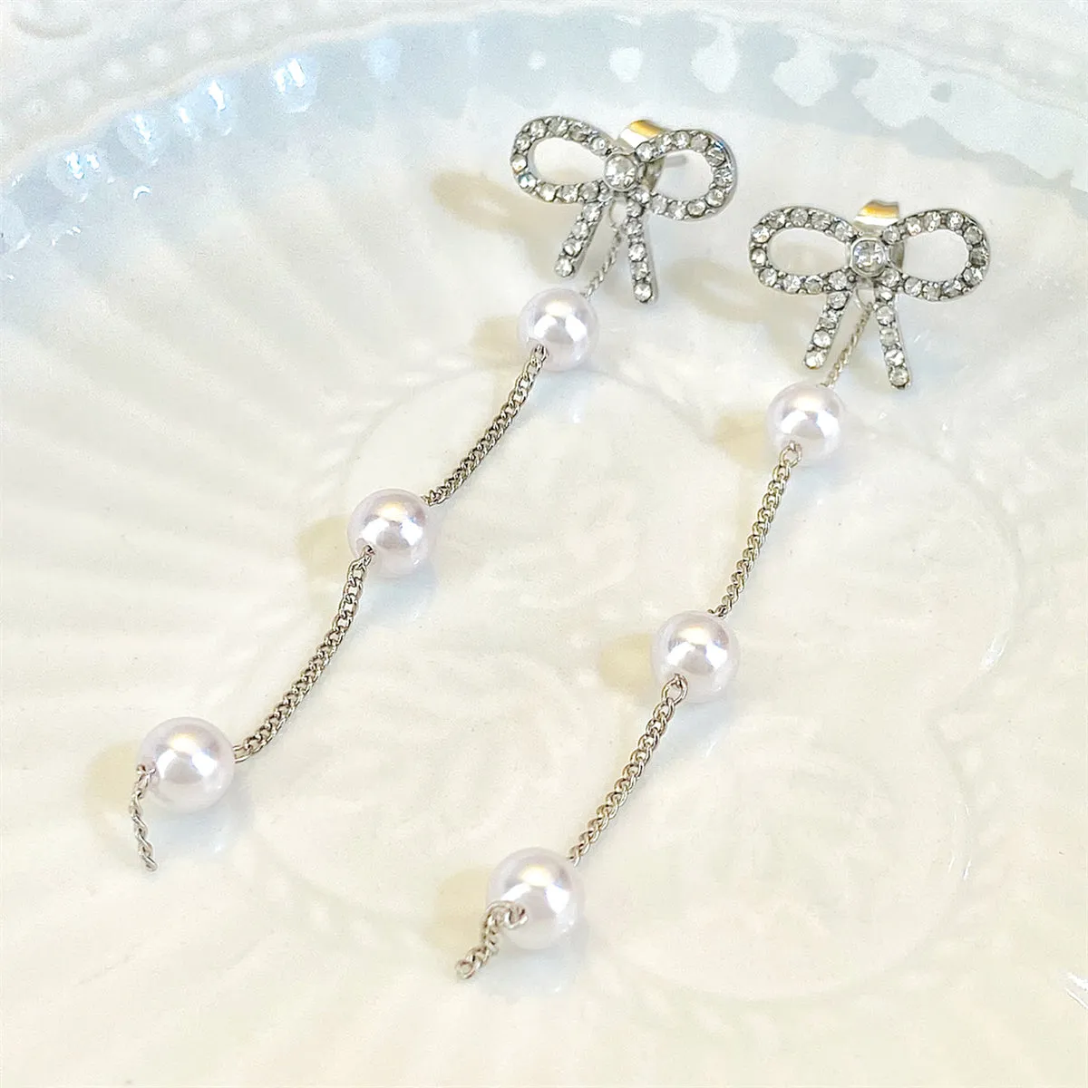 Cubic Zirconia & Pearl Silver-Plated Bow Dangle Ear Jackets